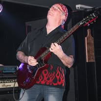 George - Lead Guitar & Vocals