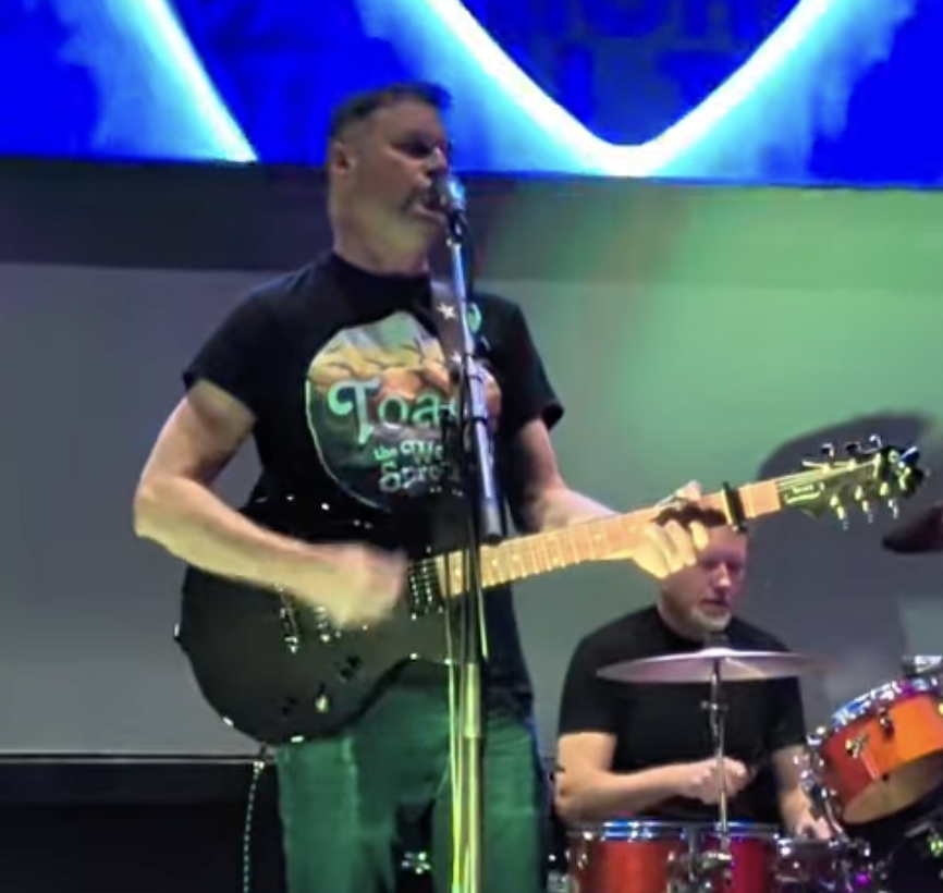 Kerry - Guitar, Harmonica & Vocals